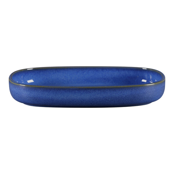 A close-up of a blue RAK Porcelain oval deep plate with a rim.