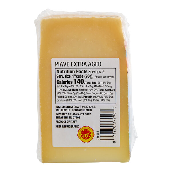 A package of Il Villaggio DOP Extra Aged Piave cheese with a label.