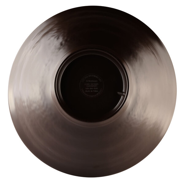 A black melamine bowl with a circle in the middle.