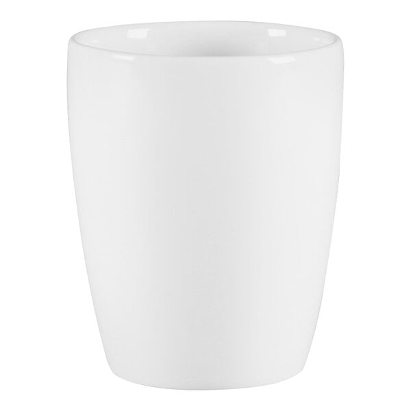 A white RAK Porcelain handleless coffee cup.