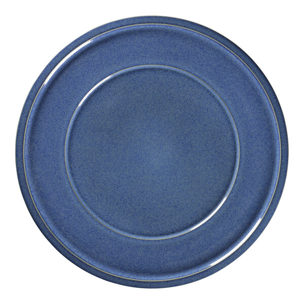 A RAK Porcelain cobalt blue porcelain plate with a gold rim.