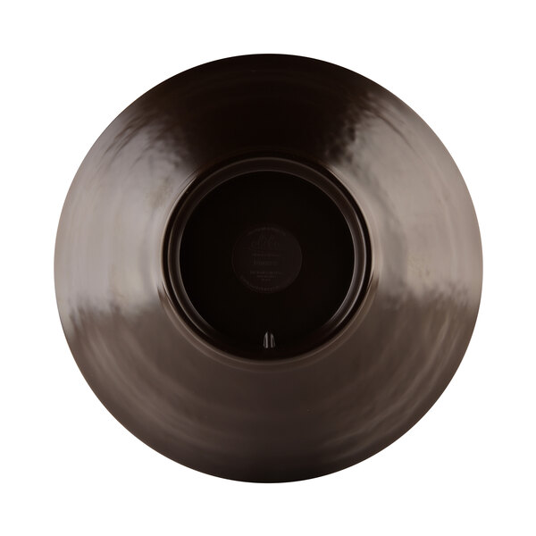 A black melamine bowl with a circular center.