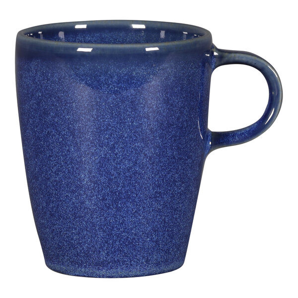 A blue RAK Porcelain coffee cup with a handle.