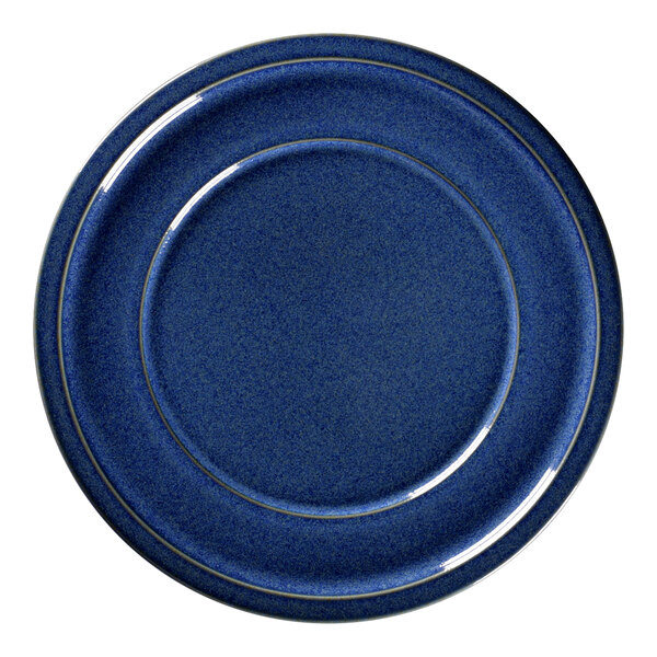 A cobalt blue porcelain plate with a gold rim.