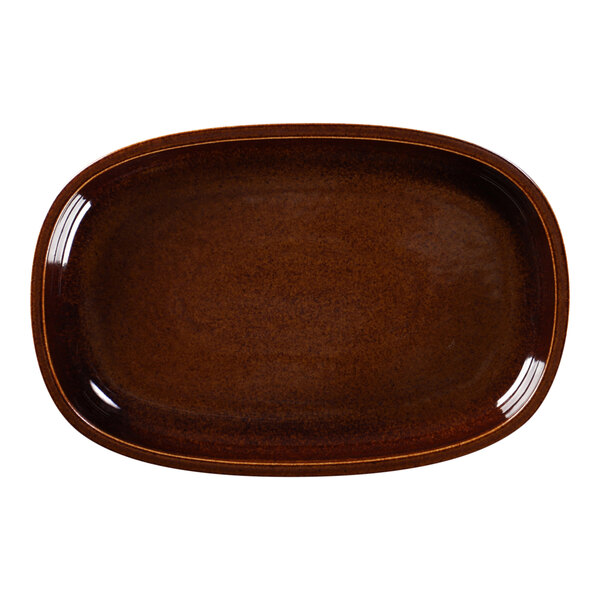 A brown oval porcelain plate with a brown rim.