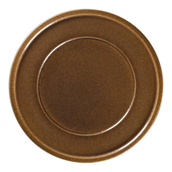 A brown porcelain plate with a circular rim.