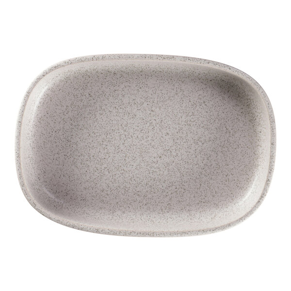 A close-up of a gray speckled RAK Porcelain oval plate.