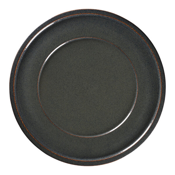 A black porcelain RAK plate with a brown rim.