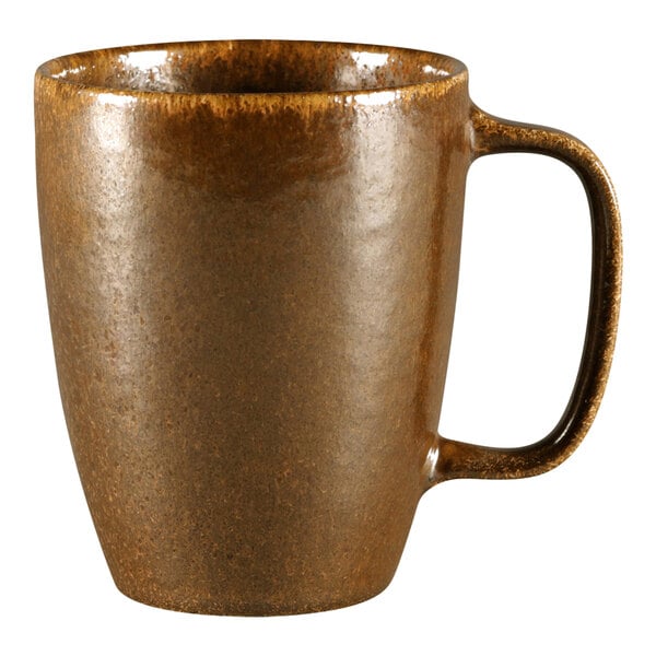 A brown RAK Porcelain mug with a handle.