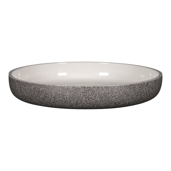 A white porcelain bowl with a gray rim.