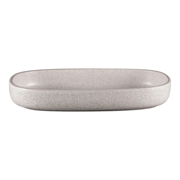 A white oval RAK Porcelain deep porcelain plate with speckled specks on the surface.