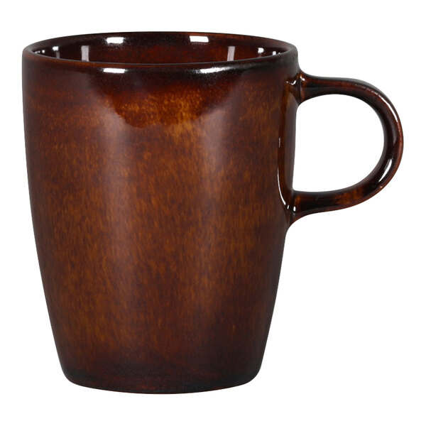 A brown RAK Porcelain coffee cup with a handle.