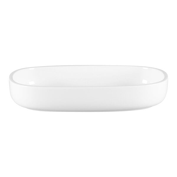 A close up of a RAK Porcelain white oval deep porcelain plate.