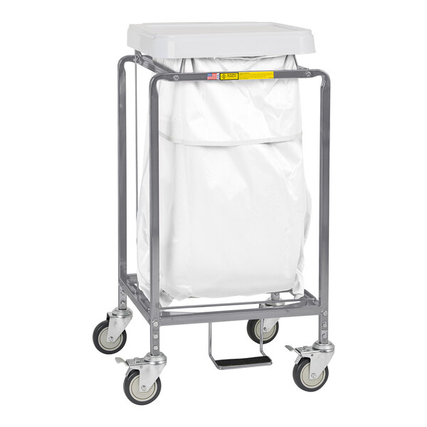 A white bag on a metal cart.