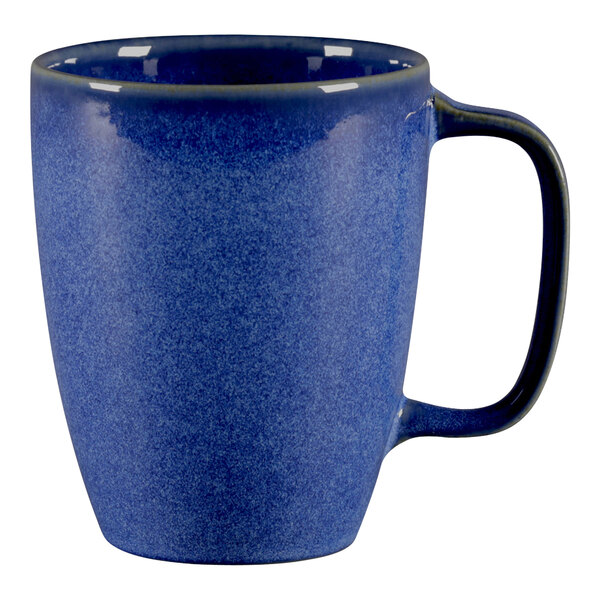 A cobalt blue RAK Porcelain mug with a handle.