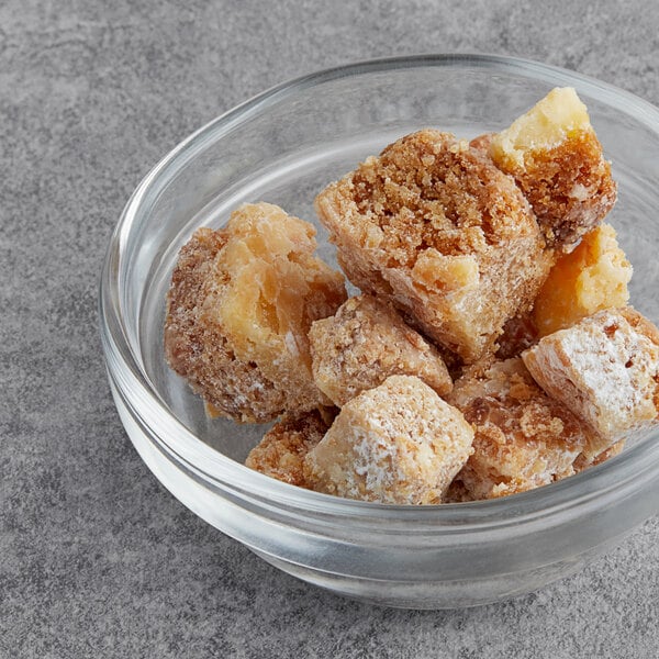 Gooey butter cake pieces in a bowl.