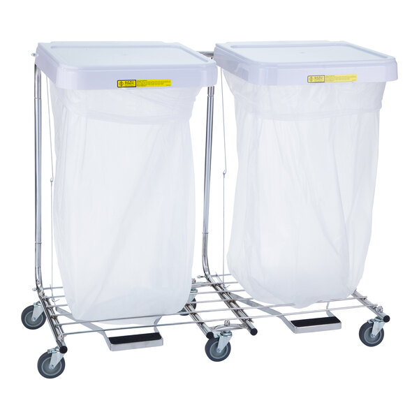 A metal cart with two white medium duty medical hampers.