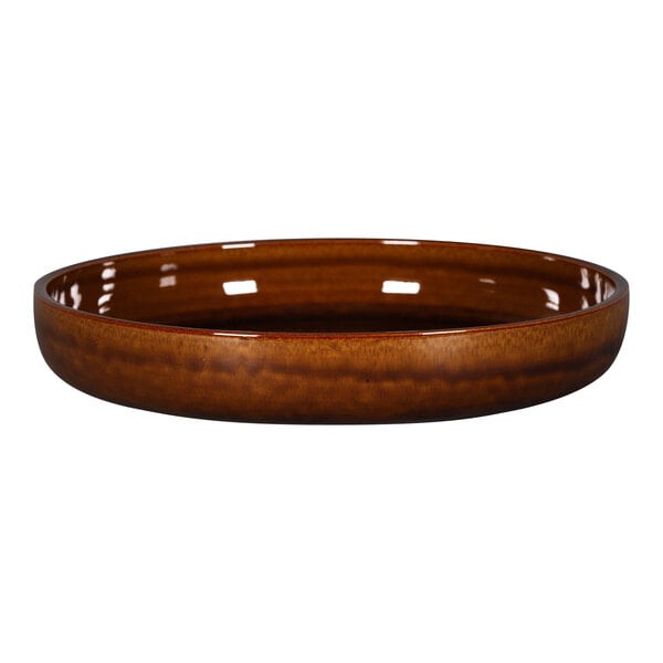 A brown porcelain bowl with a rim on a white background.