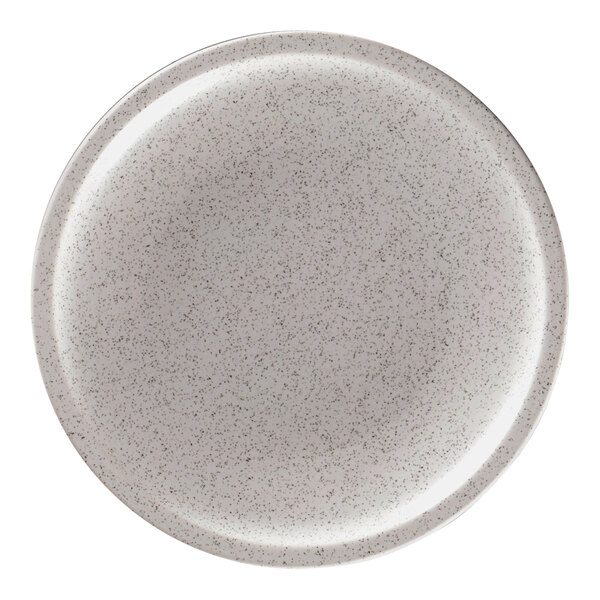 A close-up of a RAK Porcelain clay plate with speckles.