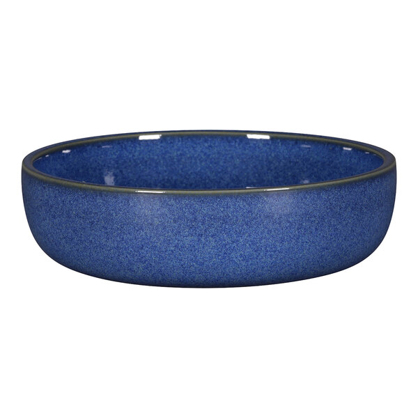 A RAK Porcelain cobalt blue porcelain plate with a speckled rim.