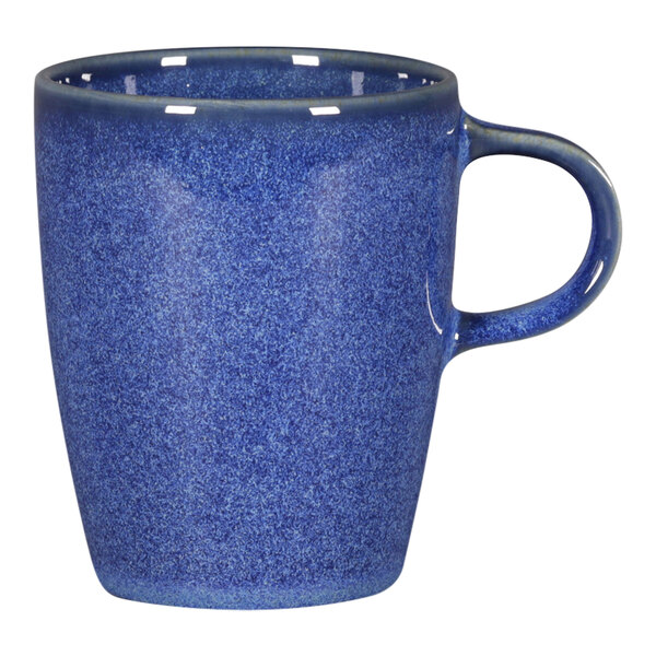 A cobalt blue RAK Porcelain coffee cup with a handle.