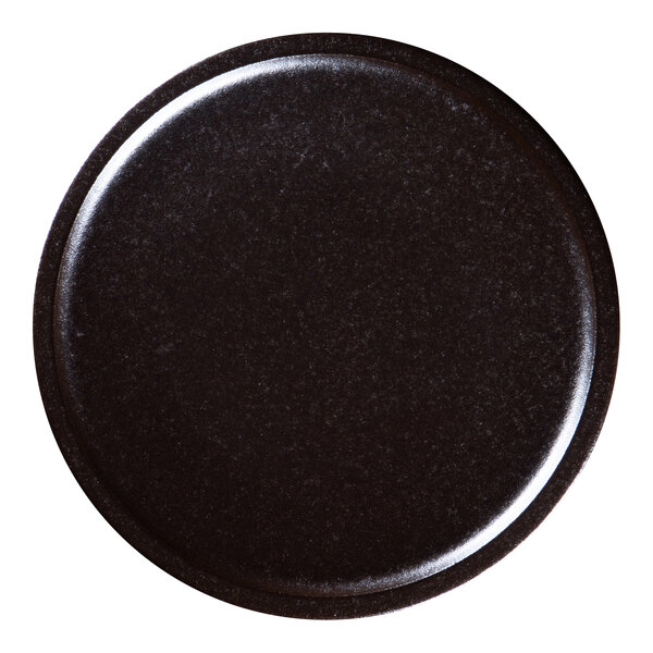 A black RAK Porcelain Forge flat coupe plate with a circular rim.