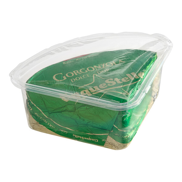 A plastic container of Gelmini Cinque Stelle DOP Piccante Gorgonzola cheese with a green and white wrapper.