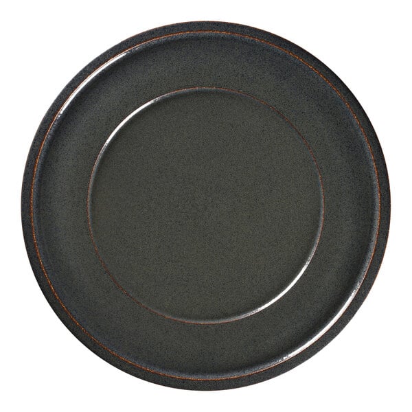 A black porcelain plate with a brown rim.