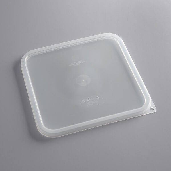 A translucent square plastic container with a translucent square lid.