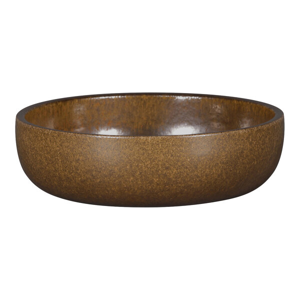 A brown RAK Porcelain deep porcelain plate with a brown rim.