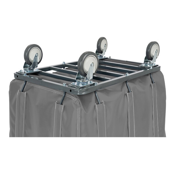 A grey container with wheels and a grey bag on top.