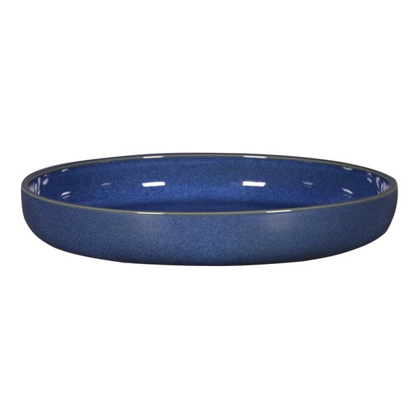 A cobalt blue RAK Porcelain deep round porcelain plate with a rim.