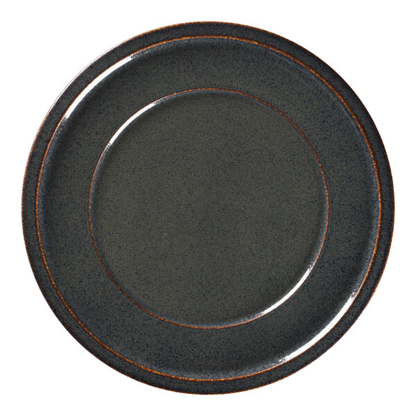 A close up of a RAK Porcelain flat porcelain plate with a brown rim.