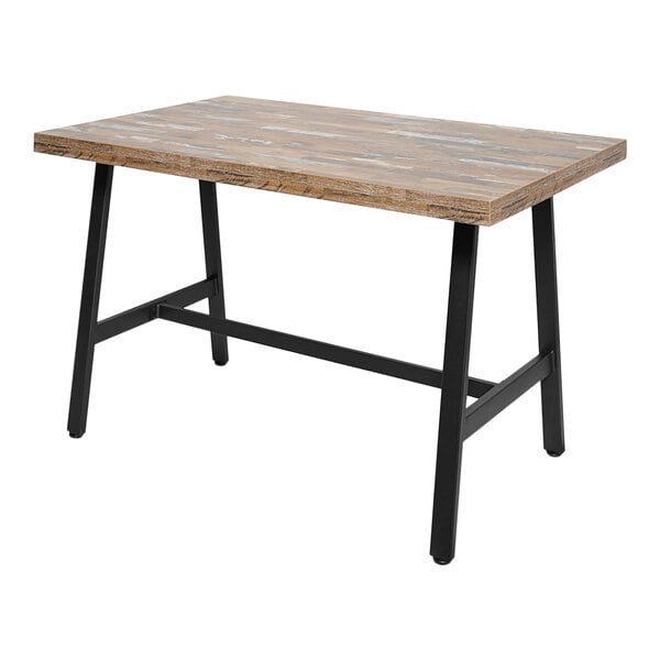 A wooden table with a BFM Seating black steel A-frame table base.