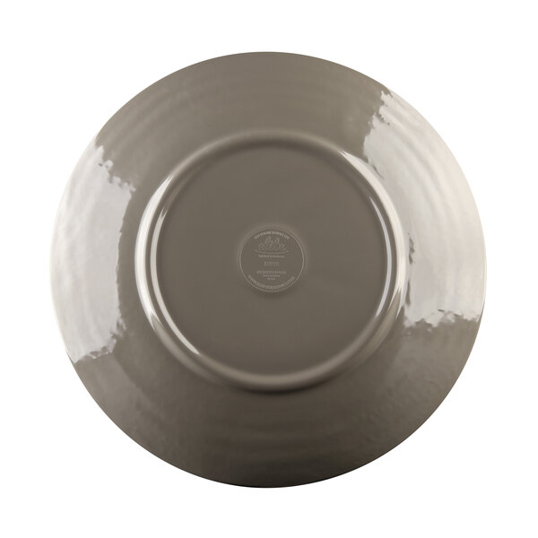 A mushroom-colored Elite Global Solutions melamine plate with a white rim.