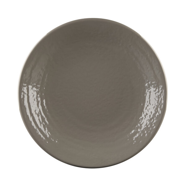 A close-up of a grey Elite Global Solutions round plate with a pebble-like texture.