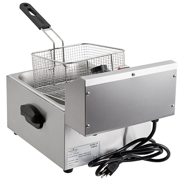 A MainStreet Equipment electric countertop fryer with a basket inside.