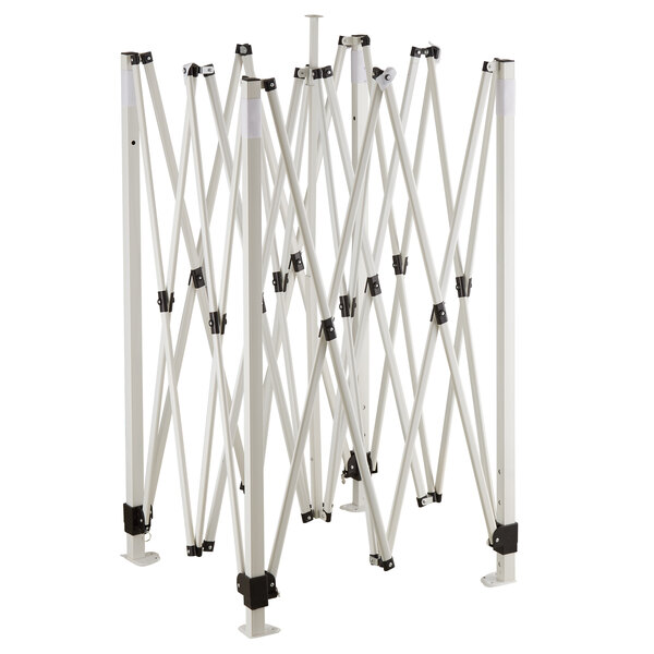 A white folding structure with black metal clips.
