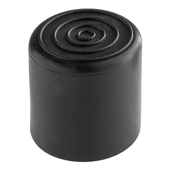 A black plastic floor glide with a circle on top.