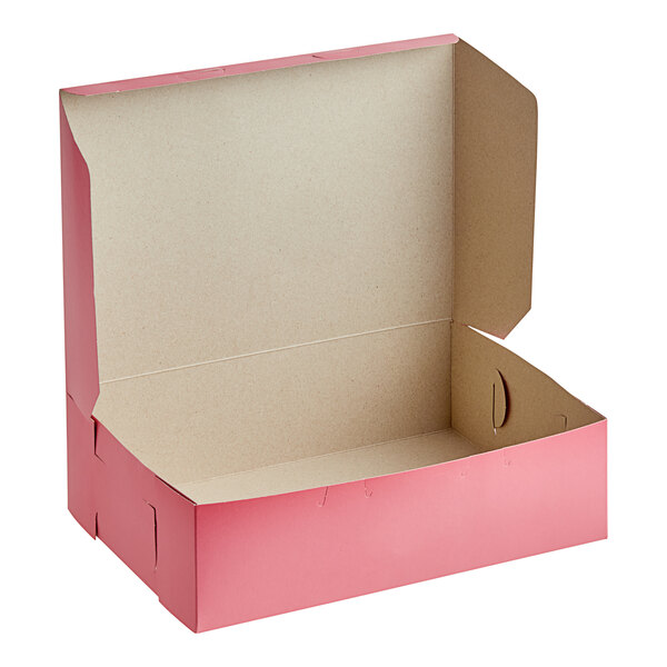 A pink Southern Champion cake box with a lid open.