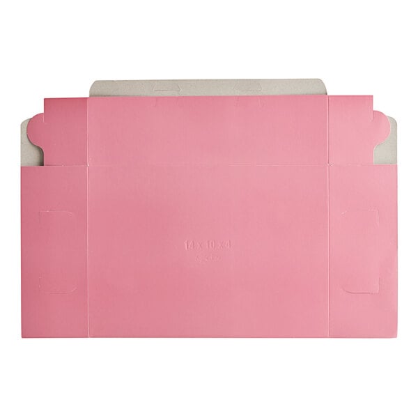 A pink rectangular bakery box with a white surface.