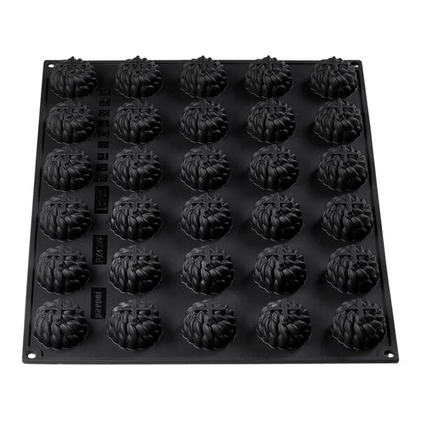 A black Pavoni silicone baking mold with round and cross-shaped cavities.