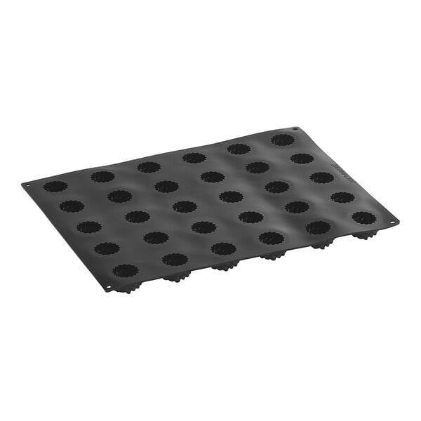 A black Pavoni Pavoflex silicone baking mold tray with 30 holes.