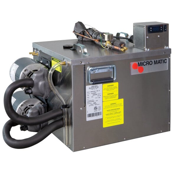 A silver Micro Matic Pro-Line Power Pack with a yellow label and black screen.