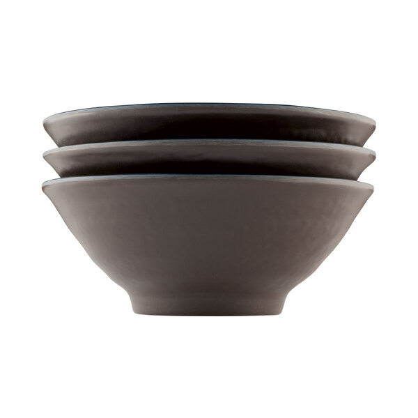 A stack of Elite Global Solutions Pebble Creek Lapis-colored melamine bowls.