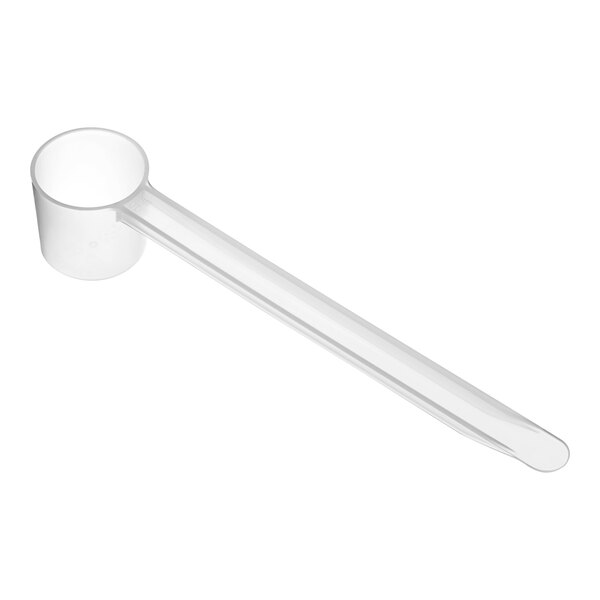 A white plastic measuring spoon with a long handle.