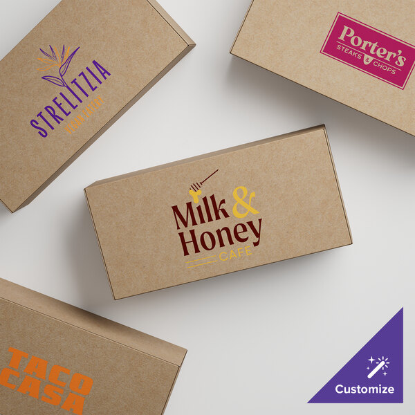 A group of 7 1/8" x 3 3/8" x 1 7/8" kraft cardboard candy boxes with customizable logos.