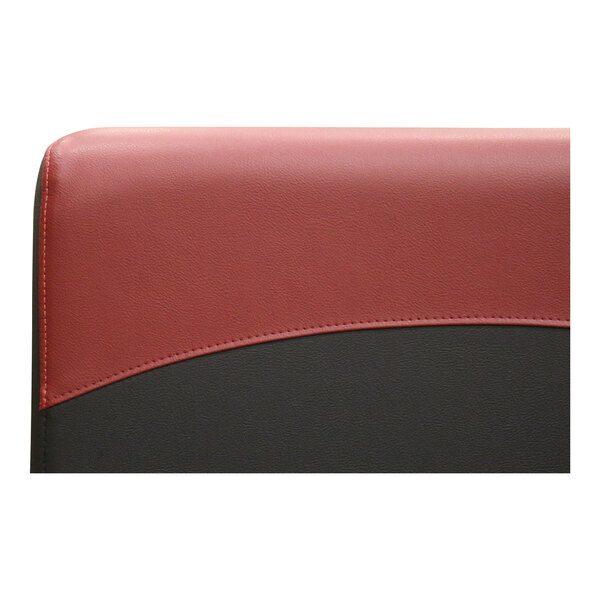 A red and black leather booth with a burgundy wave pattern.