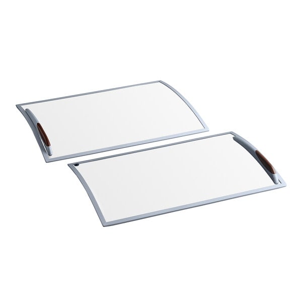 White rectangular boards with silver trim.