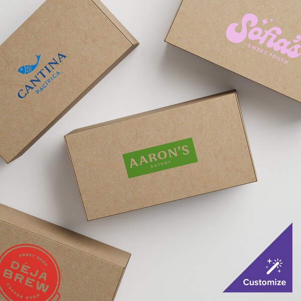 A group of brown Kraft candy boxes with green custom logos.